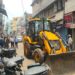 Deoghar nagar nigam action- देवघर नगर निगम ने चलाया अतिक्रमण हटाओ अभियान,टॉवर चौक से आजाद चौक के बीच कई दुकानों से वसूला जुर्माना, हिदायत भी दी गयी Deoghar nagar nigam action- देवघर नगर निगम ने चलाया अतिक्रमण हटाओ अभियान,टॉवर चौक से आजाद चौक के बीच कई दुकानों से वसूला जुर्माना, हिदायत भी दी गयी